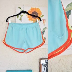 90s light blue red yellow athletic running shorts (31”)